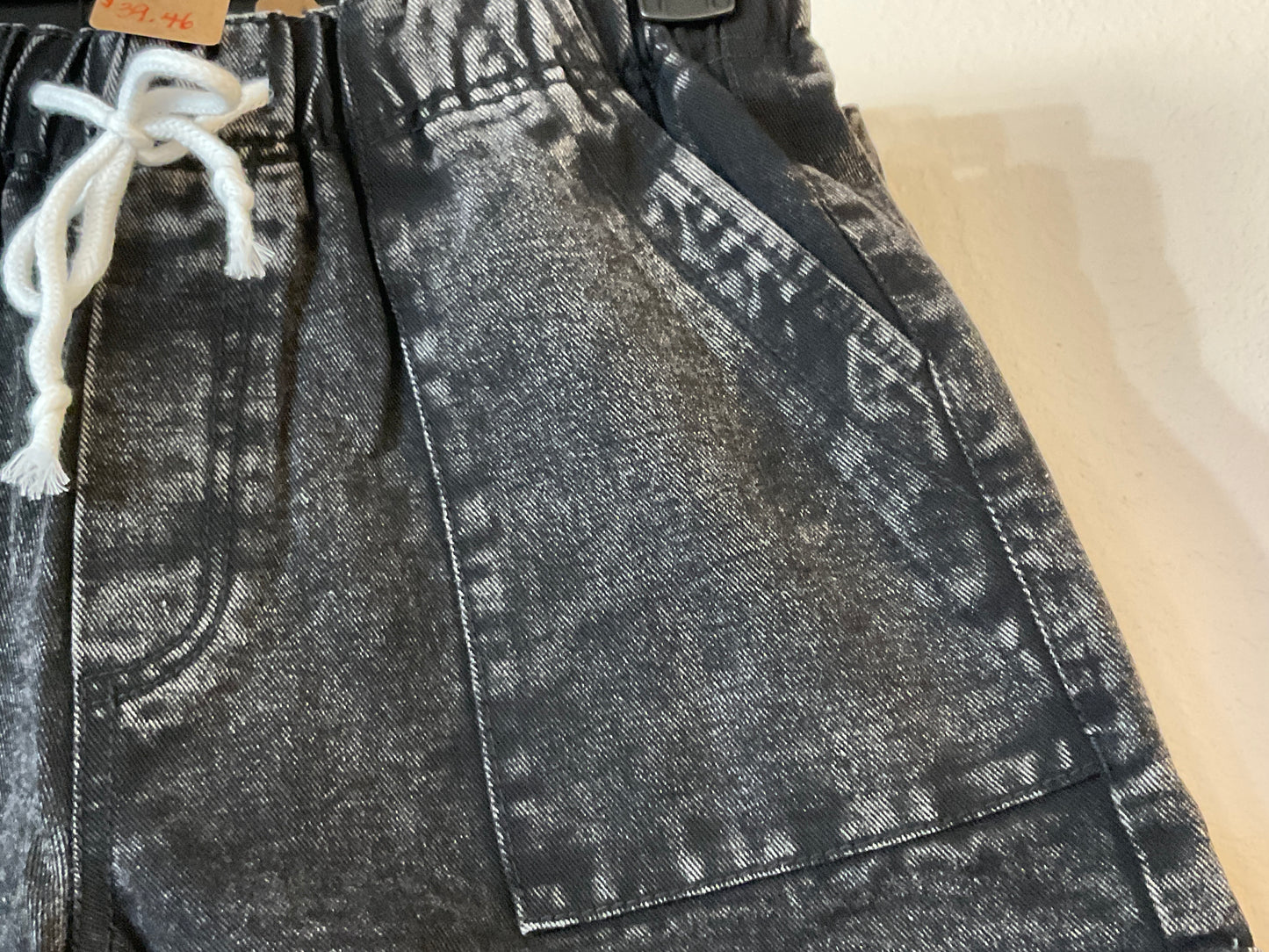 Black denim shorts