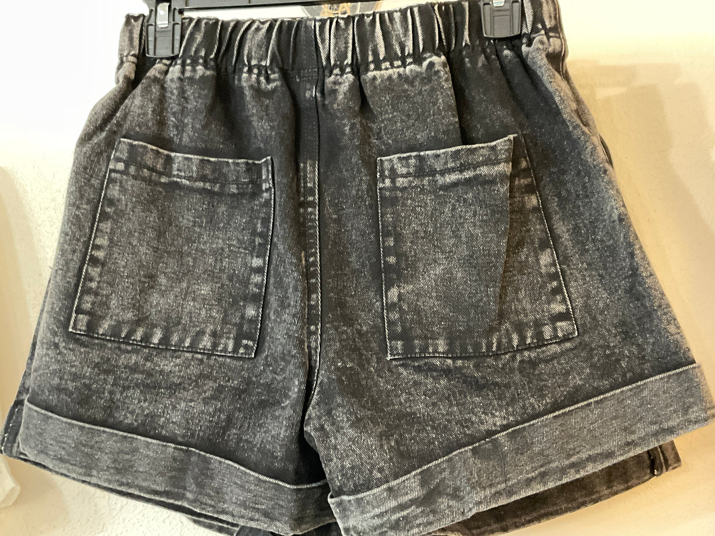 Black denim shorts